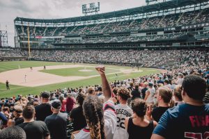 Fans watching a live baseball game inside the stadium / Betr announces online sportsbook expansion in the US